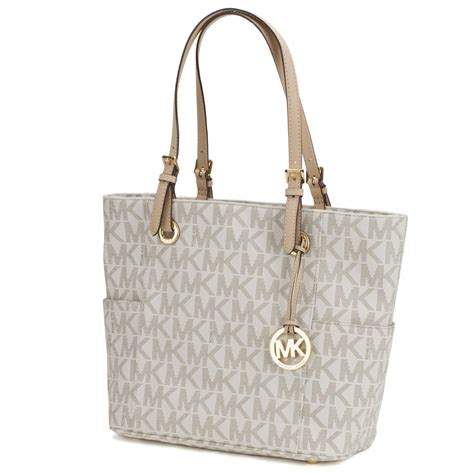 michael kors jet set tote bag vanilla|Michael Kors bag with airplanes.